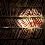 Bookshelves stacked with medical records.