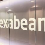 Exabeam logo on office wall