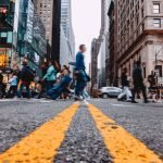 People cross the street in Manhattan.